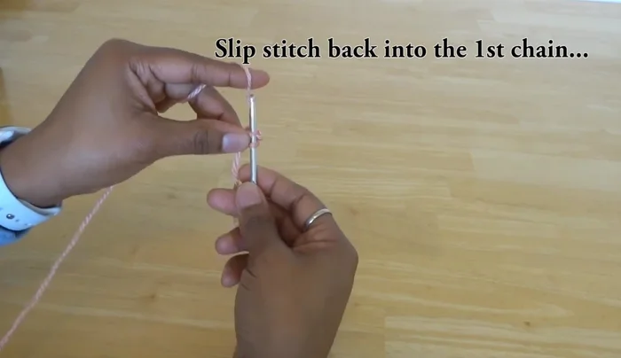 Slip stitch into the first chain to create a loop.