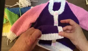 Seamless Baby Jacket Finishing: Expert Knitting & Sewing Techniques