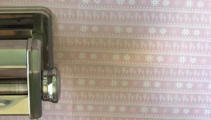 Cut out and punch hole: Punch out the background shape of the Christmas tree tag and punch a hole for hanging.