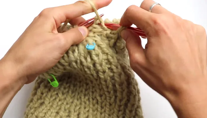 Continue alternating rounds of decreases and rounds without decreases until 8 stitches remain.