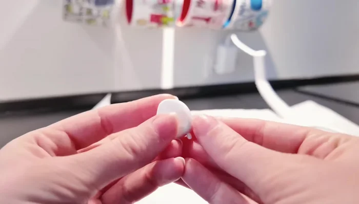 Apply UV resin evenly and cure under a UV lamp.