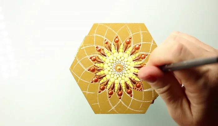 Go over the ends of the petal shapes with the pointed silicone tool.