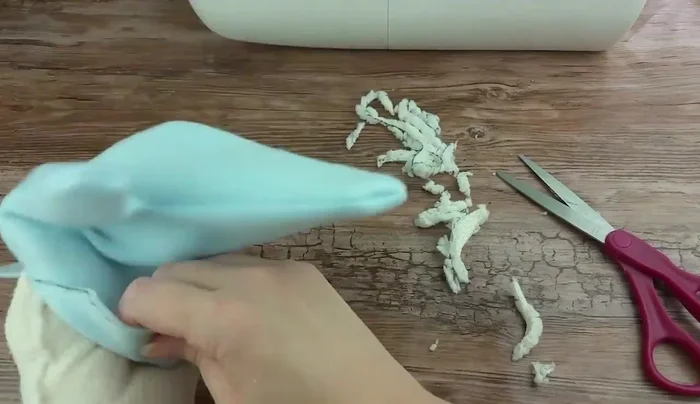 Repeat step 12 for the remaining three edges of the mitten.