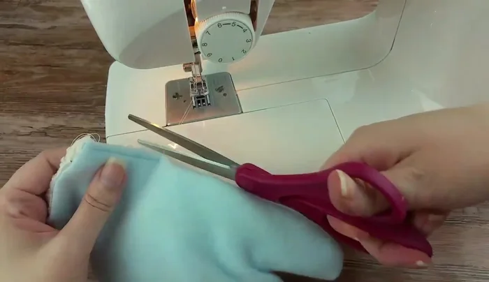 Repeat step 12 for the remaining three edges of the mitten.