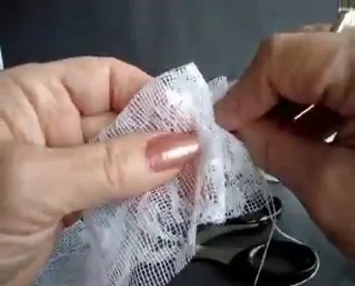 Create a channel by sewing a row of gathering stitches along the folded edge. Don't need to be precise.