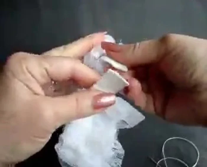 Overlap the elastic ends and sew them together securely with several knots.