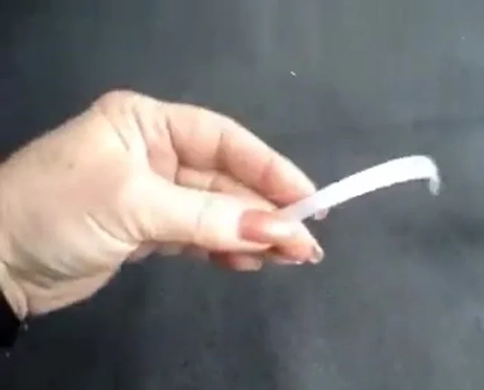 Use the 1/4 inch ribbon to tie the bow together tightly with a square knot.