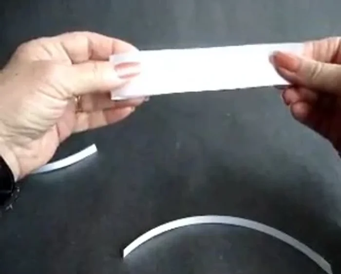 Use the 1/4 inch ribbon to tie the bow together tightly with a square knot.