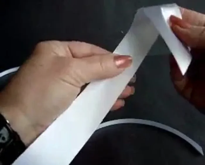 Use the 1/4 inch ribbon to tie the bow together tightly with a square knot.