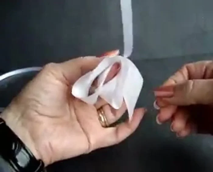 Use the 1/4 inch ribbon to tie the bow together tightly with a square knot.