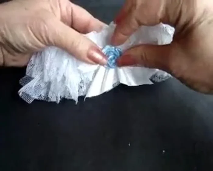 Add a small rosette (optional, for "something blue").