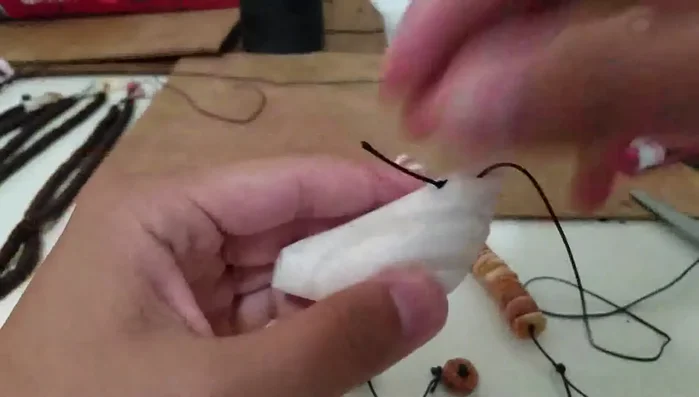 Repeat steps 2 and 3 for the other side of the necklace.