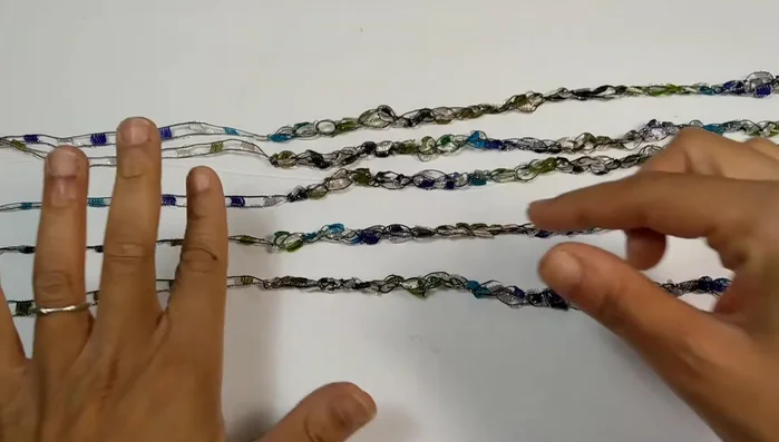 Tie a matching knot at the opposite end.