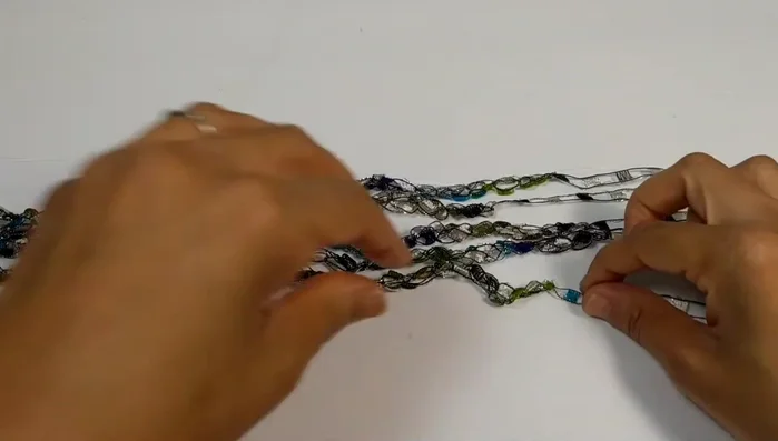 Tie a matching knot at the opposite end.