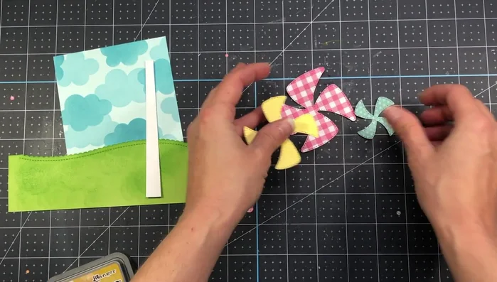 Layer pinwheels and add a circle to the center.