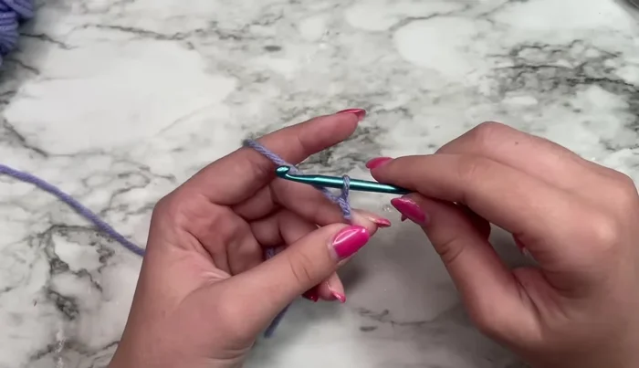 Slip stitch into the first chain to form a ring.