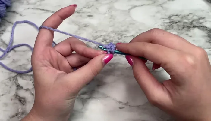 Slip stitch into the first chain to form a ring.