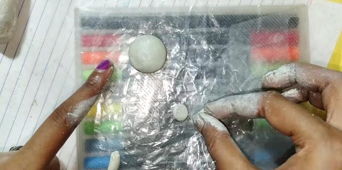 Attach the ears to the head.