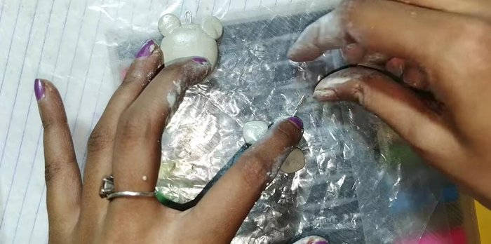 Insert pins to support the shape during drying.