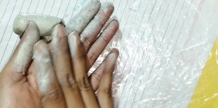 Shape the teddy bear's body and head.