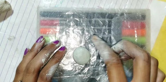 Shape the teddy bear's body and head.