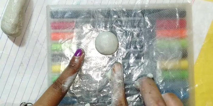 Attach the ears to the head.