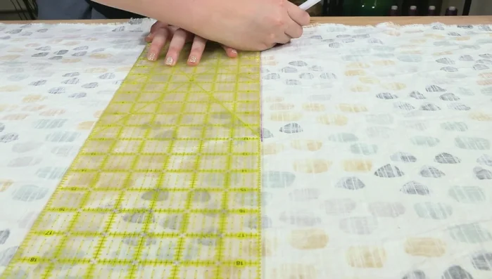 Cut out two 4 by 1.5 inch strips of fabric.