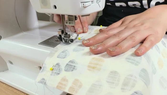 Fold the smaller strips in half the long way with the right sides together and sew up the edge. Then flip the strips right side out, iron open all seams, and iron the strips flat.