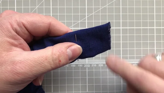 Machine stitch across the elastic ends to secure them within the casing.