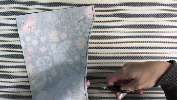 Attach the scoop pocket to one outside piece by stitching within the seam allowance.