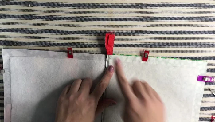 Turn the tablet holder right side out through the lining opening. Press and close the lining opening.