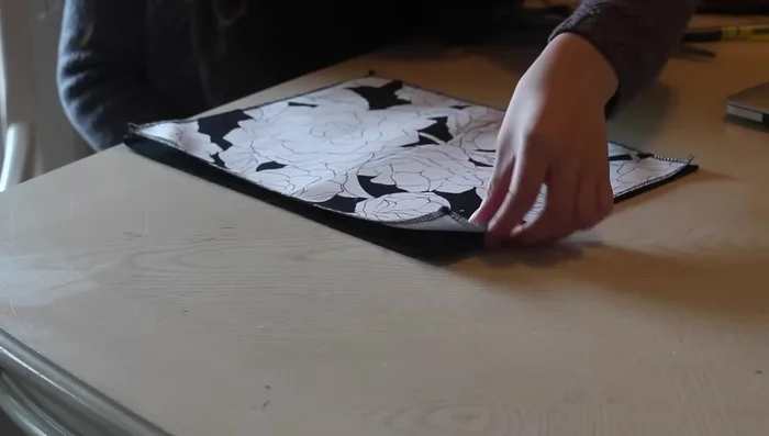 Press the zipper seam open and topstitch along the zipper on both sides.