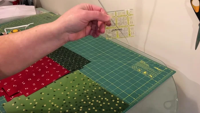 Cut and sew lining: Cut two 10.5" x 12.5" pieces for the lining. Cut out 1.5" corners. Sew the side and bottom seams, leaving a 3-4" opening for turning.