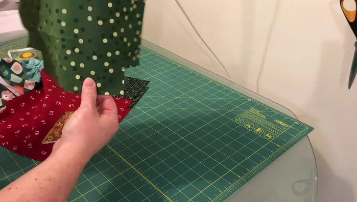 Cut and sew lining: Cut two 10.5" x 12.5" pieces for the lining. Cut out 1.5" corners. Sew the side and bottom seams, leaving a 3-4" opening for turning.