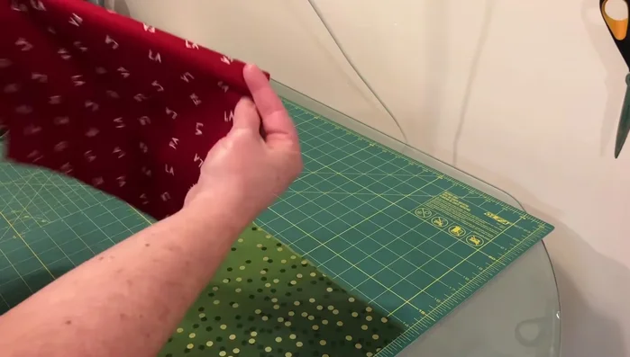 Cut and sew lining: Cut two 10.5" x 12.5" pieces for the lining. Cut out 1.5" corners. Sew the side and bottom seams, leaving a 3-4" opening for turning.